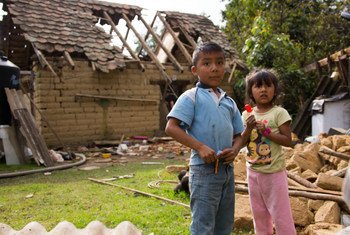 Iker, 9, and his sister Yeimire, 6, stand outside their home which was destroyed in an earthquake in San Andrés Hueyapan, Tetela del Volcán municipality, Morelos, Mexico, Thursday 21 September 2017.