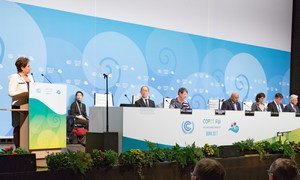 Patricia Espinosa, Executive Secretary of the UN Framework Convention on Climate Change (UNFCCC), at podium, addressing the opening ceremony of the Bonn Climate Conference.