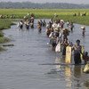 In this photo taken in mid-October 2017, Rohingya refugees that have fled Myanmar’s Rakhine state, cross into Bangladesh at Palong Khali in the Cox’s Bazar district.