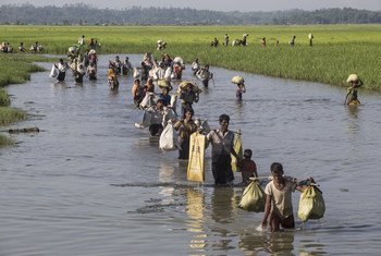 In this photo taken in mid-October 2017, Rohingya refugees that have fled Myanmar’s Rakhine state, cross into Bangladesh at Palong Khali in the Cox’s Bazar district. UNICEF/LeMoyne