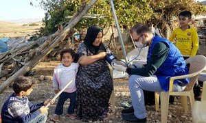 Families in Kani Bardina village, Sulaymaniyah governorate, receive health check-ups and assistance from IOM Iraq Mobile Medical team, following an earthquake on the evening 12 November.