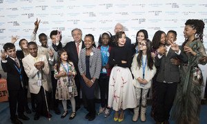 Secretary-General António Guterres and UNICEF Executive Director Anthony Lake with Children's Activists for UNICEF World Children's Day.