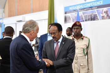 UN Special Representative of the UN Secretary-General for Somalia, Michael Keating (left), greets Somalia’s Federal President Mohamed Abdullahi Mohamed 'Farmaajo,' during the Somalia Security Conference being held in Mogadishu.