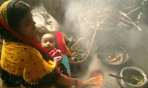 Mother and baby next to a traditional cook stove in Bangladesh. World Bank/Prabir Mallik
