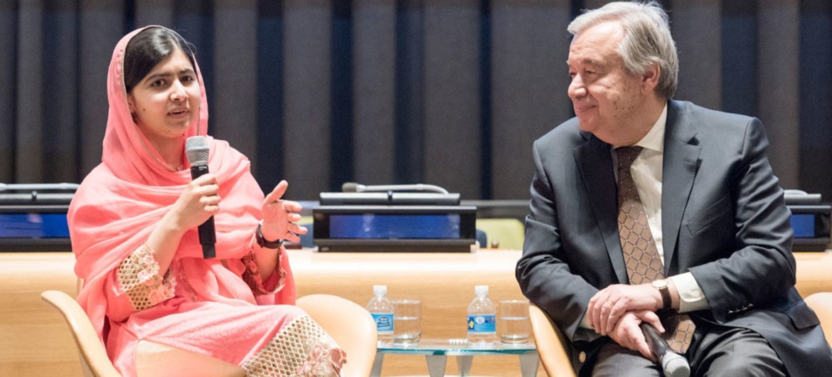 Malala Yousafzai responds to a question from the audience as Secretary-General António Guterres looks on.
