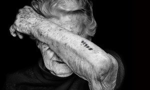 One gesture, one story: Nina Weil survived the Theresienstadt and Auschwitz concentration camps. She was tattooed with the number 71978.