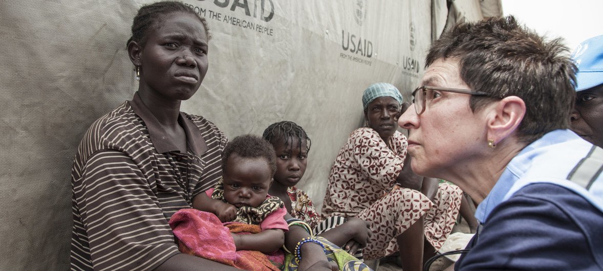 UN Deputy Emergency Relief Coordinator Ursala Mueller meets with a woman in Central African Republic who gave birth to a baby girl while she was fleeing violence to Paoua.