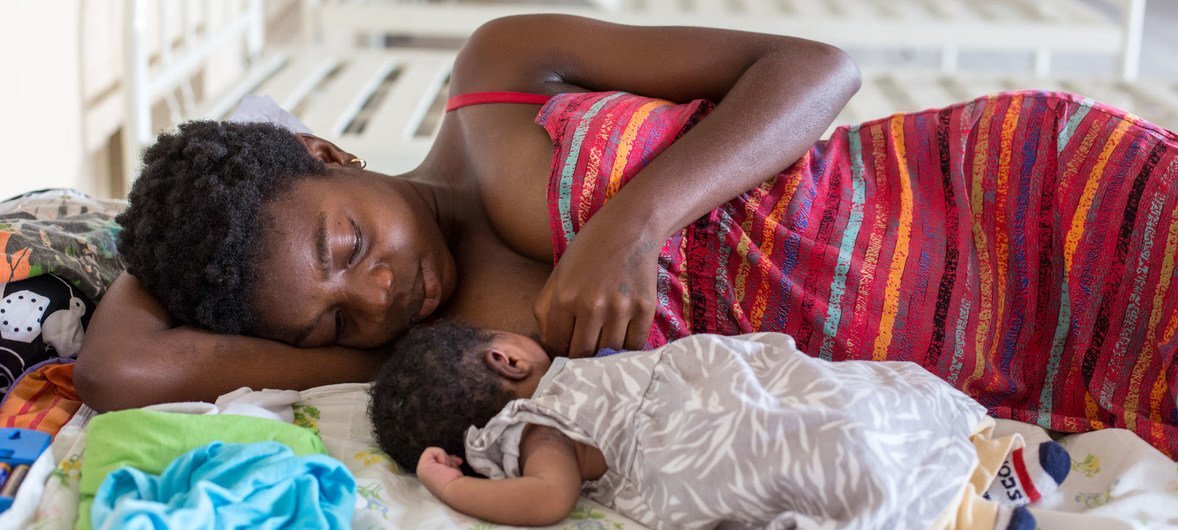 A mother is breastfeeding her newborn child at the Mother and Child Health Center in Bumbu, a district of Kinshasa, capital of the Democratic Republic of Congo, on 20 October 2017.