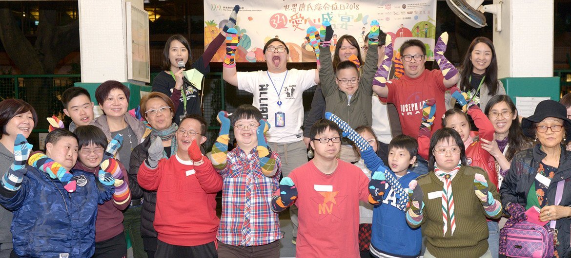在今年的世界唐氏综合征日，香港唐氏综合征协会与义工一同举行“3·21爱心盛宴“庆祝活动。