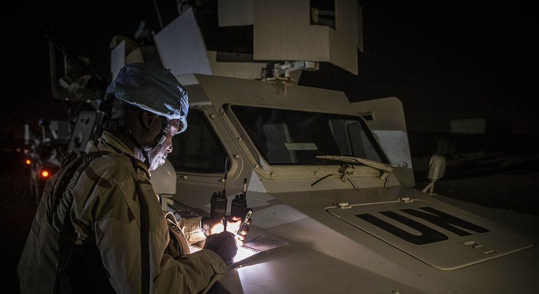 Senegalese peacekeepers during a night patrol in Gao, Mali, in May 2017. The patrols provide the soldiers with an opportunity to talk with people they meet on the streets, listen to their concerns and help them.