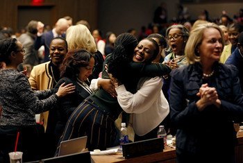 Participants at the 62nd session of the UN Commission on the Status of Women rejoice as the Commission adopts Agreed Conclusions to ensure the rights and development of rural women and girls.