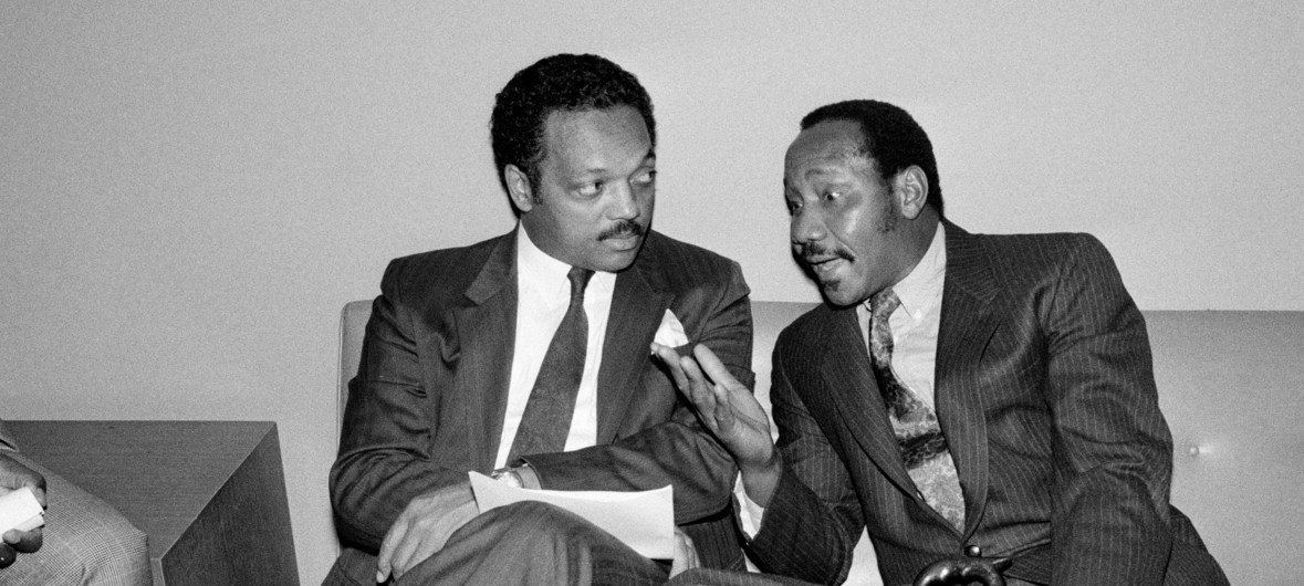 Jesse Jackson (left) speaks with the Joseph N. Garba, the Permanent Representative of Nigeria to the United Nations and the Chair of the Special Committee Against Apartheid. Rev. Jackson  was visiting the UN to address the Special Committee.