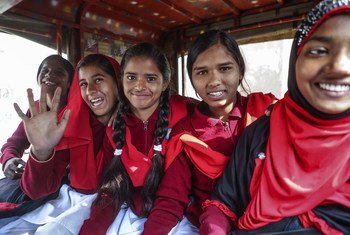 Girls who have fought child marriage go to school using a transport facility provided in the village of Berhabad, India.