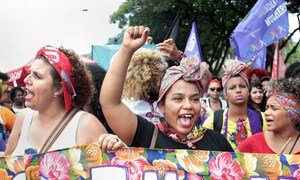 Women in Brazil march for women's rights.