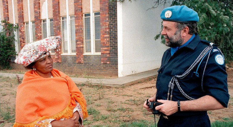 The Netherlands has sent 60 police supervisors to Namibia, such as the one seen here speaking to a resident in Windhoek, to serve on the United Nations Transition Assistance Group (UNTAG) .