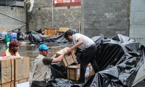 On 28 September 2017, in collaboration with the Government of Dominica, UNICEF staff load a supply of Hygiene and Dignity Kits for distribution to families affected by the Hurricane Maria at the port of Roseau, capital of Dominica.