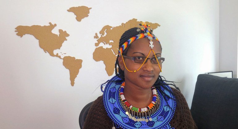 On her Maasai beaded necklace, Purity Oyie brandishes the message “Stop FMG” – female genital mutilation.