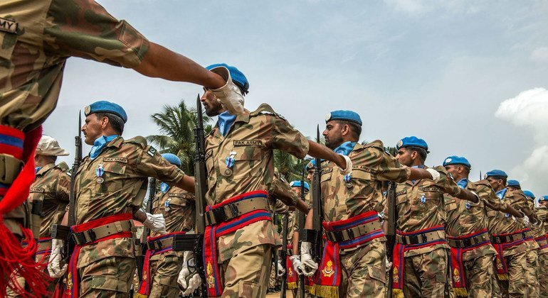 Pakistani peacekeepers march off the field after the medal awards ceremony honouring the Pakistani contingent's valuable work for UNMIL, at Camp Clara, Monrovia, Liberia (17 January 2014).