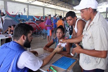 ACNUR apoya a las autoridades locales en el registro de los venezolanos que buscan asilo en Tancredo, Boa Vista, Roraima, Brasil. 