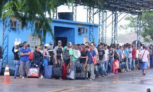 Venezuelans arrive in Pacaraima, border city with Venezuela, and wait at the Federal Police, the entity responsible for receiving Venezuelans seeking asylum or special stay permits in Brazil, 16 February 2018.