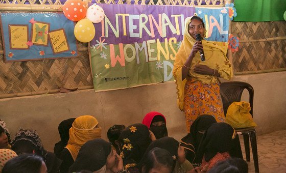 A Rohingya refugee speaks at an event commemorating International Women's Day at a refugee camp in Cox's Bazar, Bangladesh.