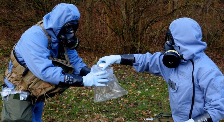 OPCW inspectors collect samples during a mock inspection exercise.