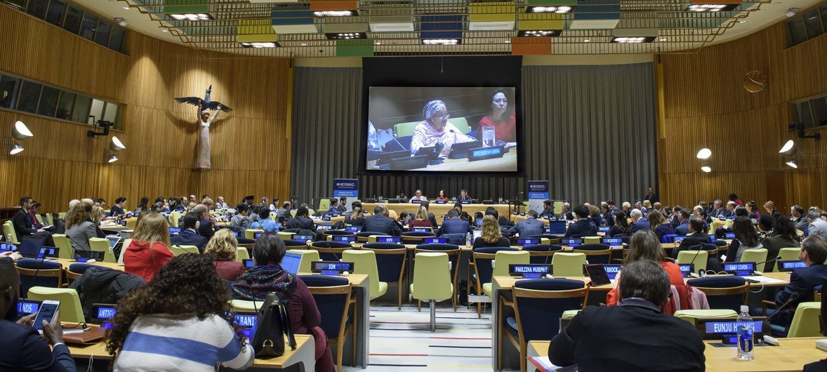 Deputy Secretary-General Amina J. Mohammed (left on podium, and on screen) speaks at the opening of the 2018 ECOSOC Partnership Forum. To her right is Marie Chatardová, the President of the Economic and Social Council.