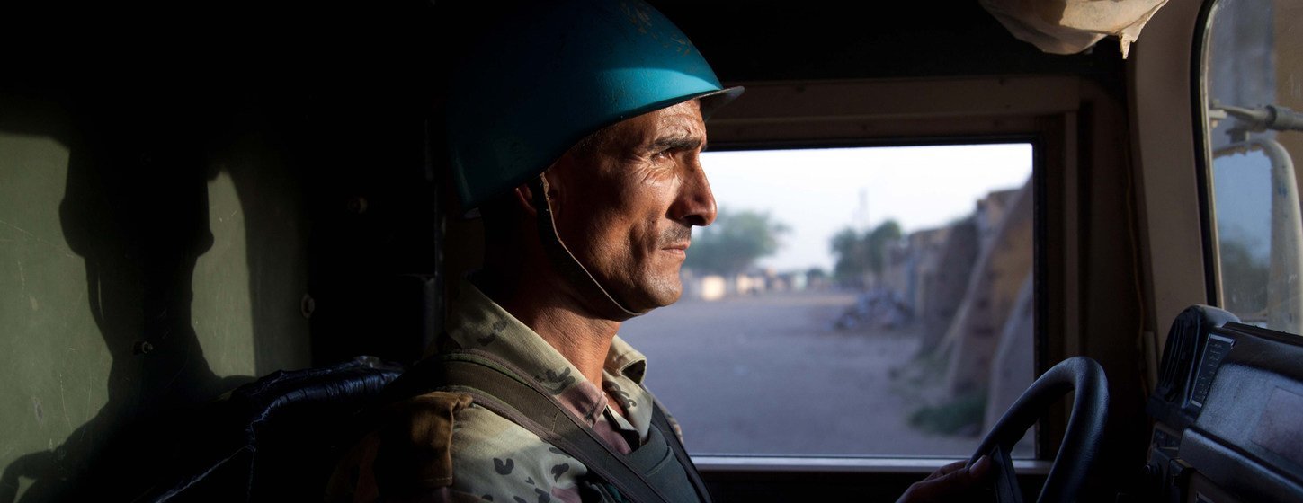 Youssif Shalabi, an Egyptian serving with UNAMID, on patrol in Um Kadada in North Darfur in September 2011.