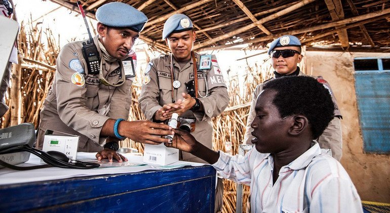 UNAMID peacekeepers from Indonesia conduct a medical campaign at the Zam Zam camp for internally displaced persons in North Darfur in February 2017, providing free basic check-ups as part of its outreach efforts.
