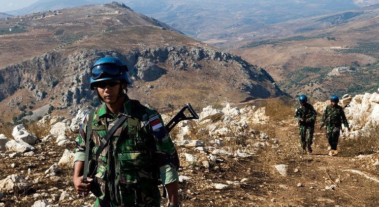 Indonesian peacekeepers serving with the UN Interim Force in Lebanon (UNIFIL) are seen here on foot patrol in the countryside near Taybe, South Lebanon, in July 2009. With over 1,200 uniformed personnel, Indonesia is the top contributor to UNIFIL, as of F
