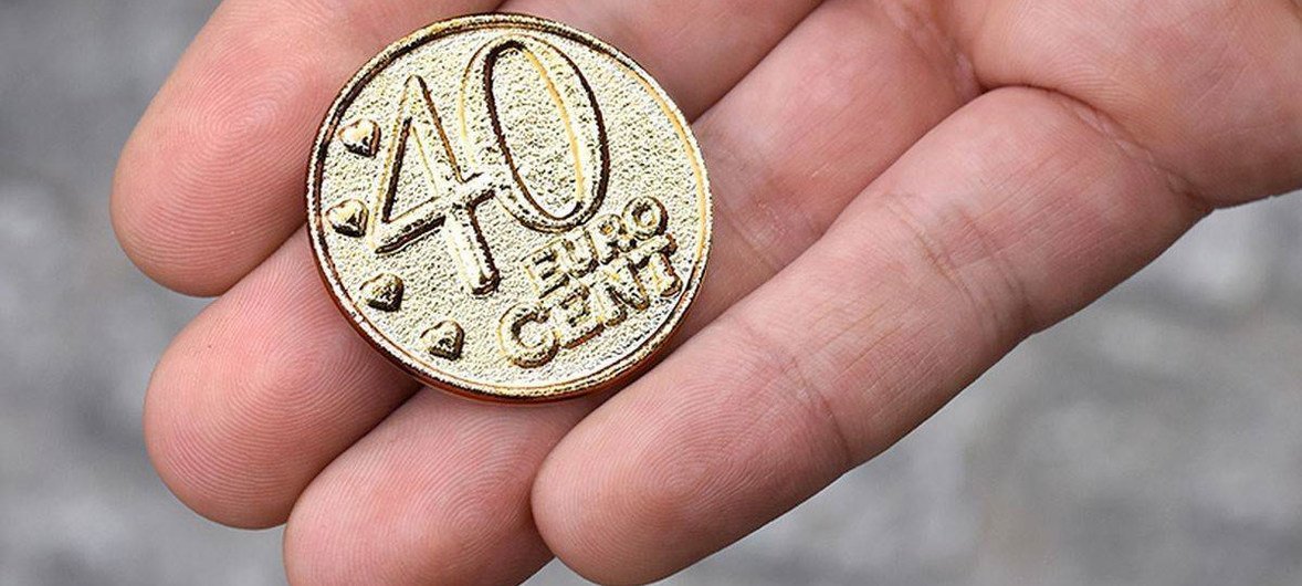 La primera moneda de 40 céntimos de Euro creada por el Programa Mundial de Alimentos para demostrar que con poco se puede ayudar mucho.