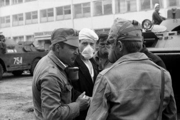 After the accident at the Chernobyl Nuclear Power Plant, thousands of Soviet soldiers assist with the cleanup. Repair crews made up of chemical defence troops mobilize for work throughout the 30 kilometre zone around the plant, including highly contaminat