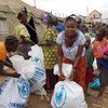 Displaced persons collect relief supplies in Ituri province, north-east DRC.  Interethnic violence has ravaged the Ituri Province since December 2017.