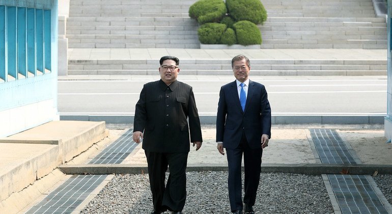 President Moon Jae-in (right) of the Republic of Korea greets Chairman of the State Affairs Commission Kim Jong-Un of the DPRK in Panmunjeom, during the April 2018 inter-Korean summit. 