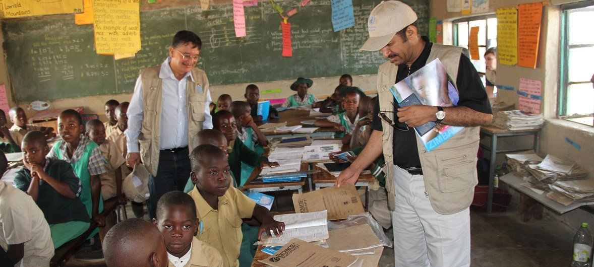 Bishow Parajuli (left), UN Resident Coordinator and Resident Representative for the UN Development Programme (UNDP) in Zimbabwe, visiting one of the UN supported resilience and community asset building projects in Masvingo Province, Zimbabwe.