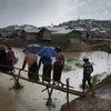 Rohingya refugees endure a heavy rain in Balukhali camp in Cox's Bazar District, Bangladesh, on 4 May 2018. UNCHR chief Filippo Grandi has appealed to regional Governments to offer more support to Bangladesh in addressing the ongoing refugee crisis.