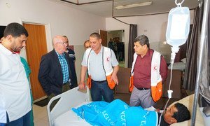 Jamie McGoldrick, second from left, the UN Deputy Special Coordinator for the Middle East Peace Process and the Humanitarian Coordinator for the Occupied Palestinian Territory, visits a patient at the Al Quds Hospital in Gaza (file).