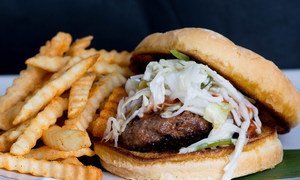 Hamburger with Fries.  WHO has released the REPLACE guidelines, to eliminate industrially-produced trans-fatty acids from food suplly.