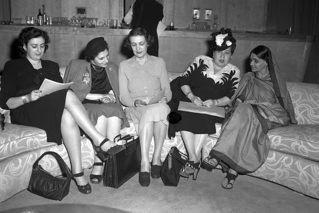 Sub-commission on the Status of Women members, from Lebanon, Poland, Denmark, Dominican Republic, and India, prepare for a press conference at Hunter College in New York on 14 May 1946.