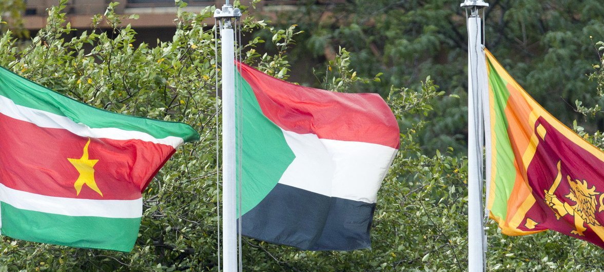 The flag of the Republic of the Sudan (centre) flying at UN headquarters in New York.