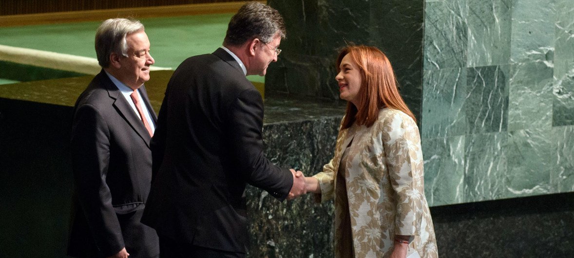 Ms. Garcés (right) is congratulated by Miroslav Lajčák, President of the 72nd session of the General Assembly, following her address to the General Assembly. Also pictured is Secretary-General António Guterres.