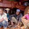 Moussa, Idriss and Mahmoud (left to right) have found shelter under a truck in Bangassou in the Central African Republic after they were displaced by violence. (file)