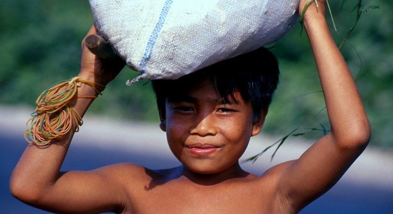 Image of INDONESIAN CHILDREN PLAY WITH FISHING NETS IN JAKARTA