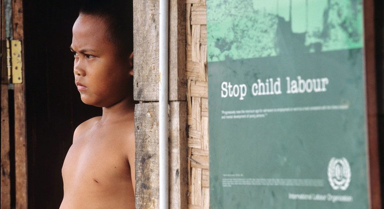 Indonesian child labourer in fishing and footwear sector.