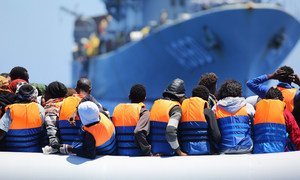 Migrants crossing the Mediterranean Sea are rescued by a Belgian ship