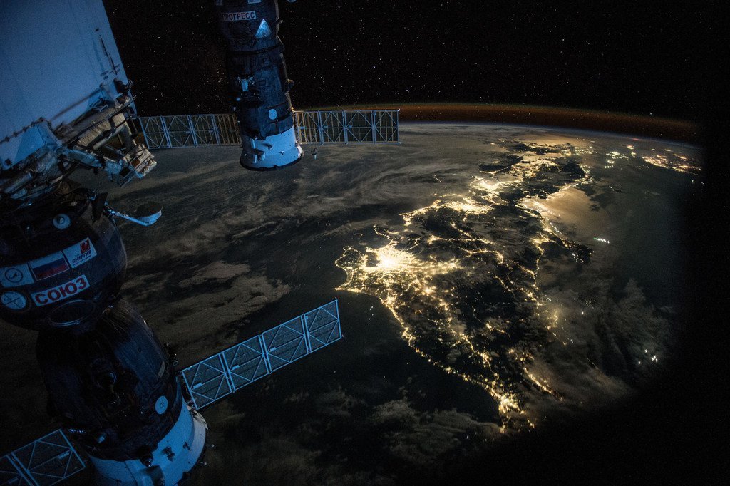 A night Earth observation photograph taken from the International Space Station, as it passes over Japan. Also in the picture are a Soyuz Spacecraft, connected to the Station’s Mini Research Module 1, and a Progress Spacecraft. 