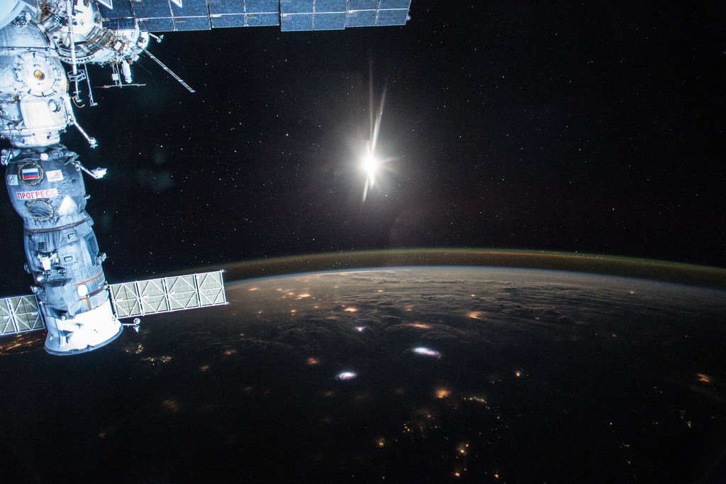 The breaking of dawn over planet Earth, seen from the International Space Station.