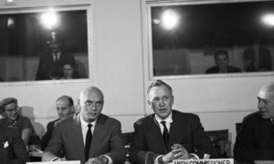 Stage and screen actor Yul Brynner, Special Consultant, and Dr. Auguste Lindt, UN High Commissioner for Refugees, attend a meeting of the UNHCR Executive Committee in Geneva in 1960. (file)