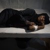 A suspected cholera patient lies on a wooden bed in a hospital in Hodeida.  15 April 2017.