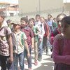 Crianças sírias que estão vivendo como refugiadas no Líbano 